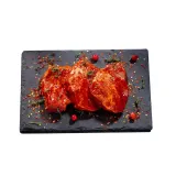Marinated pork neck with lingonberries and sage boneless